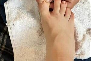 Amateur skinny girlfriend shows off her feet and talks to her followers