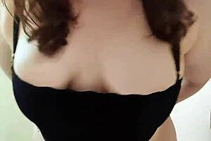 Brunette girlfriend Nicole flaunts her curves in a bathroom scene