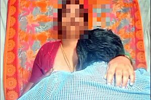 An Indian teacher is kissing with her student