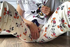 Skinny babe in pink pajamas reaches intense climax