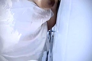 A chubby babe gets horny by playing with her tits and sliding wet fingers into her pussy