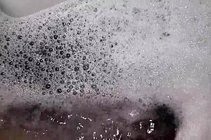 Relaxing in a bubble bath with soothing music