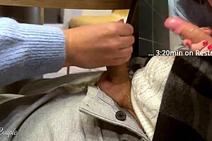 Cute babe delivers epic blowjob in public toilet after sneaky handjob