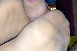 Homemade footjob features sheer nylons and teasing girlfriend.