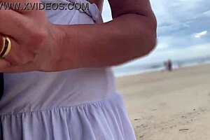 Busty MILF stranger gives handjob to big cock in public close-up POV, making him cum