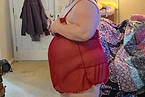 bbw with big natural tits dances naked in lingerie. she teases with striptease and huge ass in solo homemade scene.