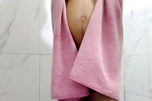 whoa this amazing brunette girl with natural tits shows pissing power during her bath solo