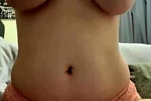 amateur with great natural pierced tits stuffs her panties in her wet puffy pussy to masturbate the panty bank - used panties
