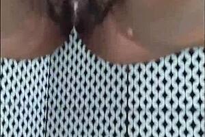 Look, this ebony slut with big natural tits shows off her chubby ass