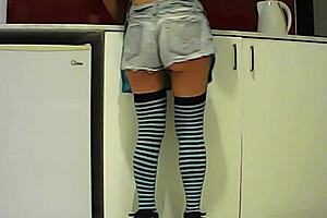 I feel so excited watching this latina brunette eat a banana in the kitchen before sucking that big cock passionately.