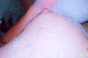 She says she loves touching her small tits in the bath