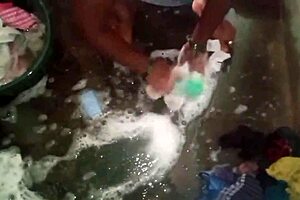 I enjoy watching my sexy aunty wash her dress in the bathroom