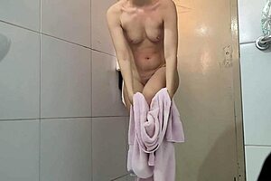 Hey, check out this skinny Latina amateur showing off her small tits and narrow ass in a solo gym bathroom session.