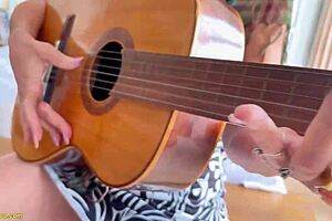 headscarf granny meets bbc guitar student for music lesson