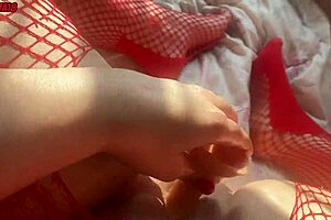 latina in red body outfit inserts toy deeply while making pleasant moaning sounds