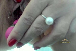 Sexy milf jerks off her hairy pussy close-up on camera moans and remotely cums on her young 18+ husbands face with her juice so that he licks everything to the last drop angela-milf