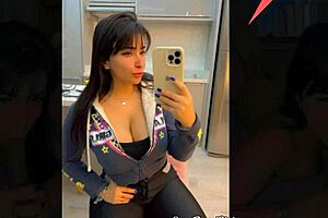 hot latina tries on sexy outfits in public store fitting room with bbc toy blowjob
