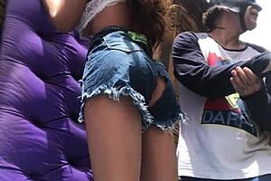 brunette amateur uses sex toy for anal masturbation in outdoor public favela setting