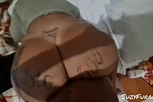 Damn, this negão is slamming his big black cock into that chubby hot brunette's ass, making her gape in bareback anal action.