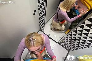 Will this blonde girlfriend with glasses and lipstick really suck cock and swallow cum in the changing booth?