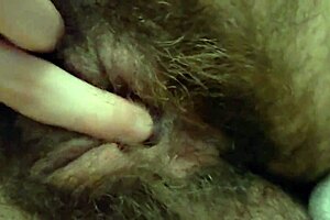 Fucking myself hard with my own big clit tied up turning it purple in close-up homemade video.