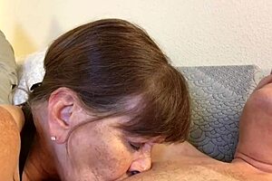 granny peggy sue takes on two cocks with deepthroat sucking