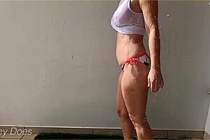 Massive Housewife Shows Off Her Big Tits in a Wet Shirt During Outdoor Public Compilation of Amazing Videos