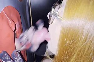 I sucked a huge cock through gloryhole at swingers club he blasted everywhere