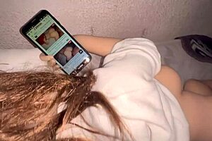 A young woman with a perfect ass watches videos on xvideos during intimate play