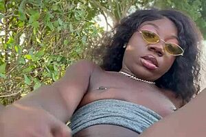 Lola black fingers her oiled ebony pussy outdoors in crazy public toy tease