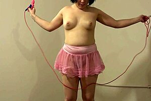 Milf jumps rope with anal plug stretching her hairy hole