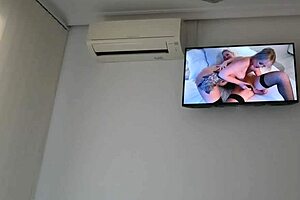 Milf fingers shaved pussy watching her lesbian porn POV
