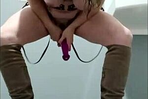 french slave in leather harness does outdoor self-bondage session