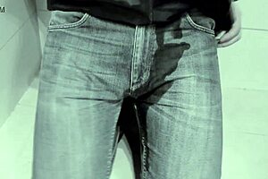 girl pees right in her jeans inside the toilet